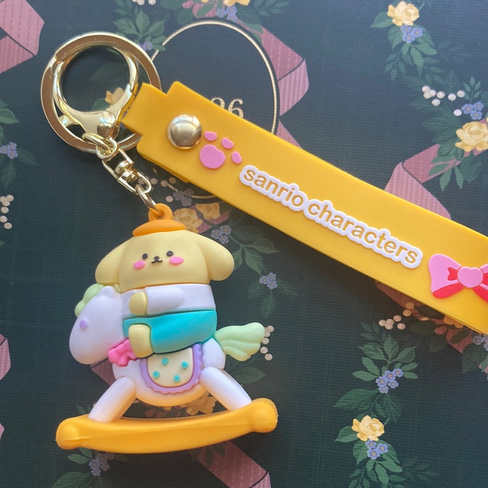 Pompompurin on Rocking Horse Keychain